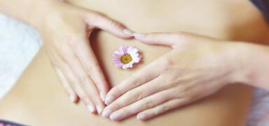 belly, hands. flower